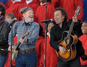 Pete Seeger and Bruce Springsteen leading a crowd at Pres. Obama's inauguration in a rollicking version of Woody Guthrie's "This Land is Your Land."