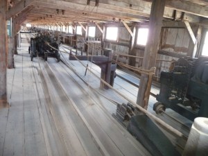 Interior view of the portion of the Plymouth Cordage Co.'s ropewalk that has been preserved at Mystic Seaport. Courtesy, Mystic Seaport, Mystic, Conn. 