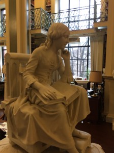 Robert Ball Hughes' "Little Nell," ca. 1851, a plaster sculpture depicting the popular character from Charles Dickens' novel The Old Curiosity Shop, sits outside the Vershbow Special Collections Reading Room at the Boston Athenaeum. 