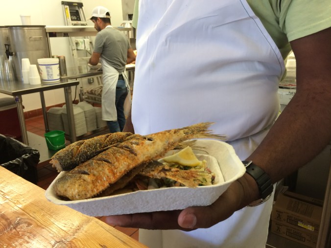 Ricky Moore serving up fresh fried herring and his special homemade slaw at his Salt Box Seafood Joint in Durham, N.C. The celebrated chef comes from my home county on the N.C. coast, and we're all mighty proud of him! Photo by David Cecelski