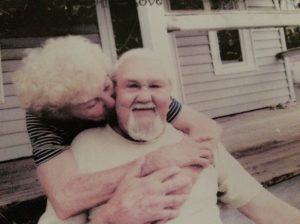 Sonny and Jenny Williamston sitting on the front porch step at the house where they first met in Sea Level, N.C. Photo by Chris Seward, Raleigh News & Observer