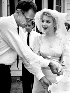 Arthur Miller and Marilyn Monroe cut the cake at their wedding in 1956. From the TV-Radio Mirror (May 1961)