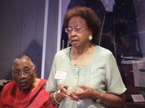Ms. Francis Jones-Isler, age 88, telling stories at the Lake Waccamaw Depot Museum. To her right is another panelist, Ms. Ida Young, age 80 at the time. Courtesy, the Lake Waccamaw Depot Museum.