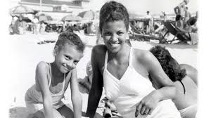 Family at Chicken Bone Beach, Atlantic City, NJ. From the John W. Mosley Collection, Charles L. Blockson Collection at Temple University Libraries.