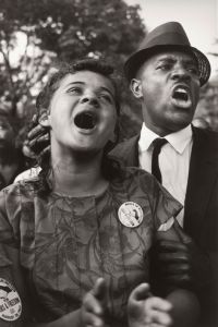 Jacquelyn Bond and Golden Frinks singing "We Shall Overcome" at the March on Washington in 1963. Courtesy, National Museum of African American History