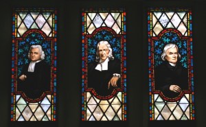 Stained glass windows depicting (left to right) Charles Wesley, John Wesley and Francis Asbury, all central figures in the establishment of Methodism. Memorial Chapel, Lake Junaluska, N.C. 