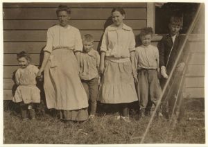 The Padgett family, Weldon, N.C. (Halifax County). Alfred, age 13, far right, and Richard, age 11, worked at the Shaw Cotton Mills. According to Lewis Hine, Alfred made $4.00 a week prior to a recent injury on the job (note his bandaged right hand). Richard made $2.40 a week. Photo by Lewis Hine. Courtesy, Library of Congress, Prints and Photographs Division