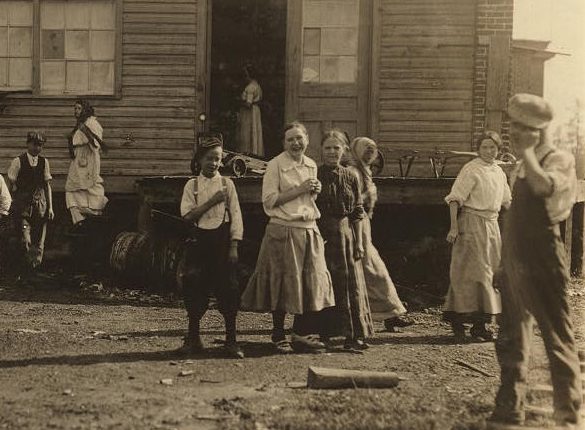 Alice Padgett laughing and holding her hands together, Shaw Cotton Mills, Weldon, N.C. Detail of photo by Lewis Hine. Courtesy, Library of Congress, Prints and Photographs Division 
