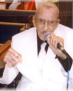 Joel Davis, Phyllis Holliday's father, singing at St. John Missionary Baptist Church in Roxbury, Mass. A graduate of the Queen St. School in Beaufort, N.C. in 1930, he moved north during the Great Depression. He was a devoted gospel singer and sang in his church choir and in gospel groups throughout his life. He died in 2010, at the age of 100. Courtesy, The Boston Globe, Sept. 29, 2010.