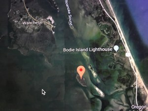 Duck Island (the red mark) is a marshy hammock 2 miles south/southeast of Roanoke Island. It is located in the waters where Roanoke Sound is opening up into the Pamlico Sound, 2 and 1/5 miles southwest of the Bodie Island Lighthouse. From Google Maps