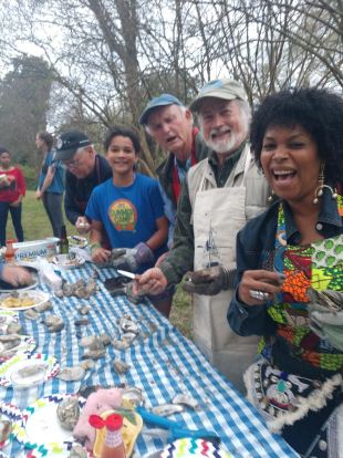 My awesome oyster shucking crew-- David, Zora, Tom, Bland and Michelle-- at a recent fundraiser that we held for the Stagville Historic Site. Photo by David Cecelski