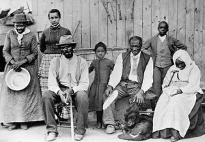Harriet Tubman, her adopted daughter Gertie Davis and her husband Nelson Davis, 1870s or '80s. Schomburg Center for Research in Black Culture, Photographs and Prints Division, New York Public Library.