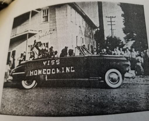 Miss Homecoming, Ms. Ovella Godette, and the Queen Street High School Homecoming Parade passing by the Godette Hotel in 1951. From the school's annual, The Seagull. Courtesy, Esther Anderson Williams and Ellen Williams Cavanaugh