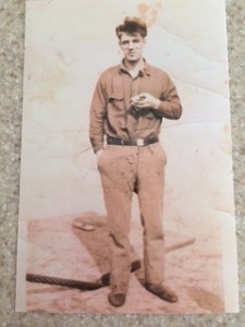 Oivind Lee on the deck of the dredger Clinton, ca. 1927-33. Courtesy, the Lee family