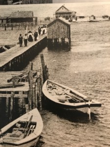 Shad boats tied up at sound side wharf, Old Nags Head, ca. 1900. Courtesy, State Archives of North Carolina