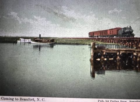 Postcard view of the railroad to Morehead City on which Russell Coles traveled. This is on the causeway that was built over the marsh between Morehead City and Beaufort. For generations, locals called it the "Old Mullet Road" or the "Old Mullet Line" for the seemingly endless barrels of that salted fish with which they filled its freight cars. From Edward Ellis, "Havelock Station Railroad History" (remarks to Havelock Historical Preservation Society), July 27, 2004.