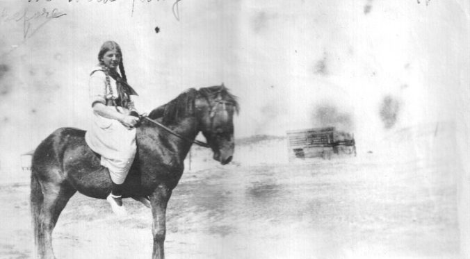 Theresa Ambler and one of the island's wild ponies, ca. 1921. Photo courtesy, Walter Coles, Sr., Chatham, Va.