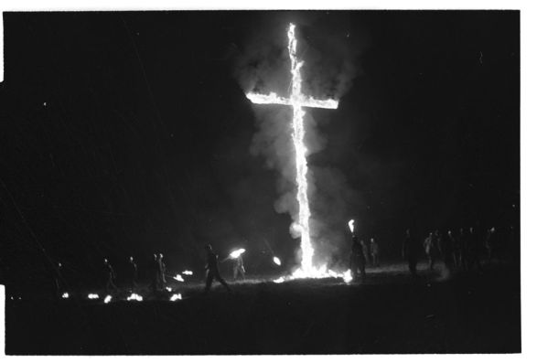 KKK members burning a cross in Greenville, N.C., 30 miles north of Ernul, Oct. 18-19, 1965. From the Daily Reflector Image Collection, ECU Digital Collections