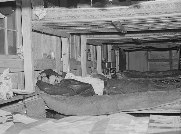 Many of Ft. Bragg's construction workers lived in tobacco barns and sheds that farmers turned into bunkhouses. Photo by Jack Delano. Courtesy, Library of Congress.