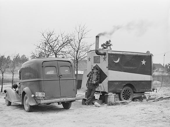 Near Fayetteville, N.C., 1941. These construction workers were living in a trailer that they had bought from a fortune teller at a circus. They came from West Virginia to work at Ft. Bragg. Photo by Jack Delano. Courtesy, Library of Congress