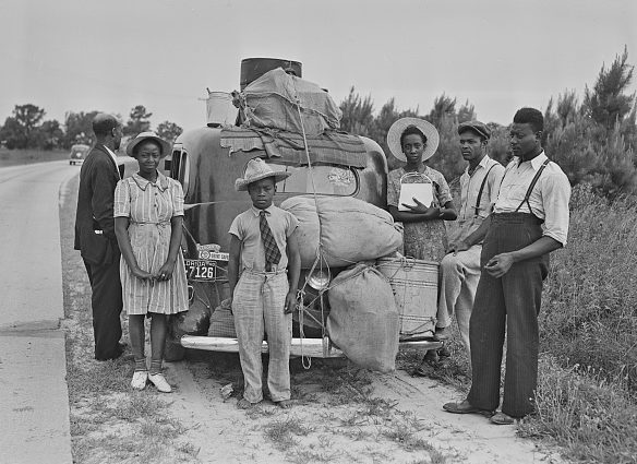 Near Shawboro, N.C., 1940. Having finished the potato harvest there, this group of Florida migrant laborers was headed to pick crops in New Jersey. Photo by Jack Delano. Courtesy, Library of Congress