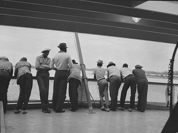 On the Norfolk-Cape Charles ferry, 1940. This group of migrant workers had finished the potato harvest in Camden County, N.C., and were headed to a new job on the Eastern Shore of Virginia. Photo by Jack Delano. Courtesy, Library of Congress