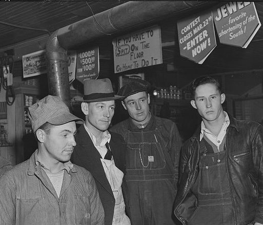 Fort Bragg construction workers at a country store, probably in Manchester, N.C., 1941. Photo by Jack Delano. Courtesy, Library of Congress