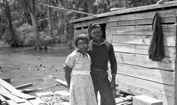 An enchanting young couple at the Terrapin Point shad and herring fishery in Bertie County, N.C., ca. 1938-39. Photo by Charles A. Farrell. Courtesy, State Archives of North Carolina 