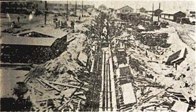 Sewage line under construction, Fort Bragg, N.C., 1918-19. Just to get building supplies to the center of the base, workers had to clear a wide swath of forest for several miles. Hundreds of mule teams then hauled piping, lumber and other materials along that route until better roads and railroad lines were built. From Camp Bragg and Fayetteville: Sketches of Camp and City (Richmond, Va.: Central Pub. Co., 1919).