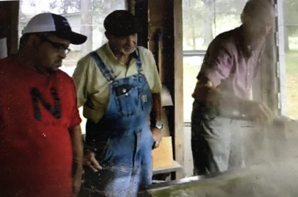 Boiling sorghum to make syrup. From "The Coharie Tribe: Soil, Sorghum and Sovereignty"