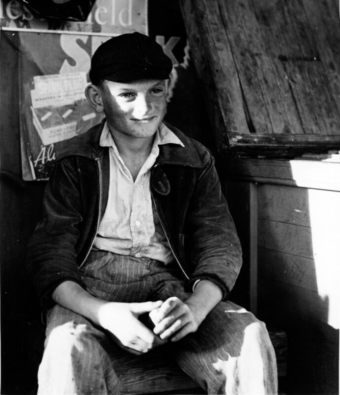 Melva Marines McKeever was born across the river from Sneads Ferry, in the village of Marines, in 1925. She wasn't sure, but she thought this young man might be the son of a woman named Bessie Riggs, perhaps Doughton or Willard Riggs. She remembered Bessie Riggs as a widow who lived simply at Poverty Point and made her living as a net mender. In his notes to his photograph, the photographer, Charles Farrell, noted that boys were helping their fathers with their nets by this age and up to that time would have been expected to be fishermen like their fathers. That was changing on the eve of World War II, however. The village's boys were already joining the Navy and other branches of the Armed Forces by the time that Farrell last visited Sneads Ferry early in 1941. In addition, the construction of Camp Davis (10 miles west) and Camp Lejeune (just across the river) would transform the local economy for generations to come and provide many kinds of employment besides fishing. Photo by Charles A. Farrell. Courtesy, State Archives of North Carolina