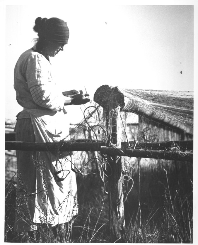 She lived at Poverty Point, where she was not the only woman that mended nets to help her family get by. Photo by Charles A. Farrell. Courtesy, State Archives of North Carolina