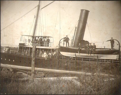 The steam yacht Peerless when Tom Pigott was her captain and Giles Whitehurst was her first mate or engineer, place unknown, ca. 1900 to 1915. Courtesy, Giles Willis, Jr.