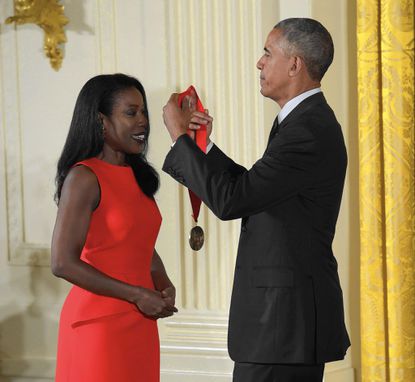 In Black Wide-Awake, Lisa Y. Henderson reflected on Wilson's black migrants to New York City in a post dedicated to Isabel Wilkerson's magnificent book on the Great Migration, The Warmth of Other Sons: the Epic Story of America's Great Migration. Wilkerson is pictured here receiving the National Humanites Medal from Pres. Obama in 2015. Courtesy, Susan Walsh/AP