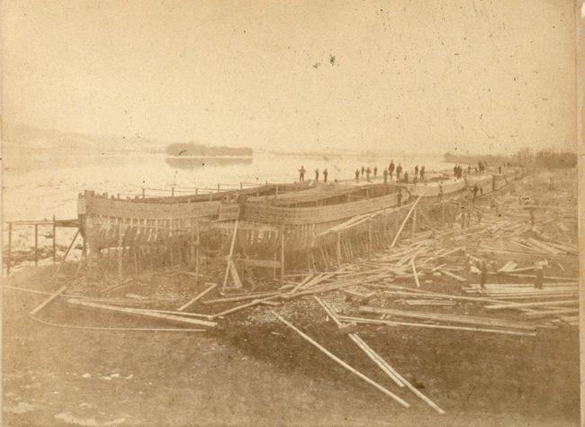 In the heyday of canal transportation, the construction of boats for the Schuylkill Canal was a big business. In this photograph, taken in the 1870s, workmen are building Schuylkill Canal boats on the Susquehanna River near Harrisburg, Penn. Courtesy, Pennsylvania Historical and Museum Commission