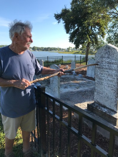 Dennis Chadwick showing me to Charles D. Chadwick's grave at a family cemetery in Beaufort, N.C. Photo by David Cecelski
