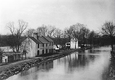The Schuylkill Canal passing through New Providence, Penn., ca. 1900-1920. When first in operation in 1827, the canal stretched 108 miles from Port Carbon to Philadelphia and employed 92 lift locks to overcome the difference in elevation between the two places. Courtesy, Schuylkill Canal Association