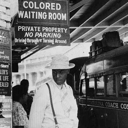 Bus station in Durham, N.C., 1940. During WW II, segregated bus and train stations often became flash points for protests and altercations when black Marines passed through towns such as Durham (shown here), Raleigh and Rocky Mount, N.C. Photo by Jack Delano. Courtesy, Library of Congress