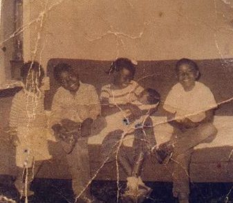The Scott children in 1958. From left to right, Barbara, Roland Jr., Margaret with baby Joyce, and Alphonso. Photo courtesy, the Scott family