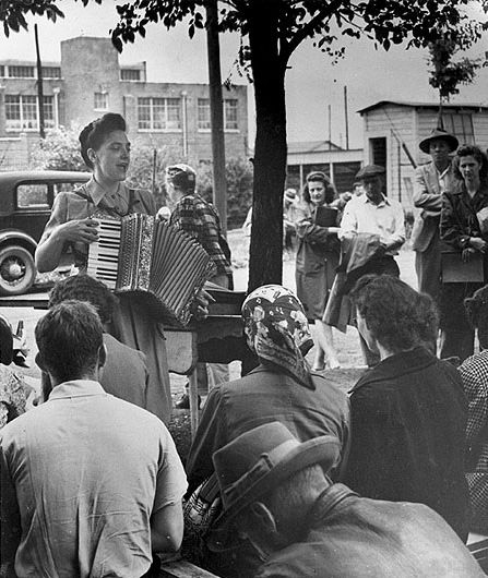 Musician and activist Zilphia Horton leading singers on a picket line in the 1940s. Location unknown. I am unclear how much time Zilphia spent in Lumberton in 1937. Julius Fry referred to her being there at least occasionally during the union struggle there, but other sources indicate that she was also working with TWOC union efforts in other parts of the South at that time. Photo courtesy, Highlander Research and Education Center