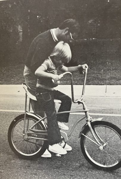 Jimmy and Ryke Longest, Rose Hill, N.C., ca. 1972-74. Ryke was one of Wolcott's youngest interviewees. He liked dinosaurs, G. I. Joe, and hot dogs with ketchup. He also wished that his Dad would watch a little less sports on TV and play with him instead. From Rose Hill. Photo by Reed W. Wolcott