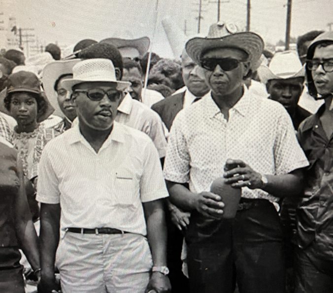 The Rev. Martin Luther King, Jr., and Floyd McKissick, Sr., leading the March against Fear near Jackson, Mississippi, in June 1966. Courtesy, Alabama Dept. of Archives & History