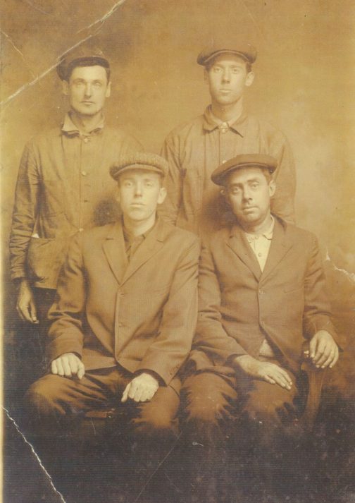 Cicero Goodwin (front left) in his younger sailing days. His brother Dennis is standing (right) next to an unidentified sailor. Cicero's granddaughter Rosa Chance Johnson identified the fourth figure (front right) as a Mr. Eason, one of Cicero's cousins. Photo courtesy, Rosa Chance Johnson