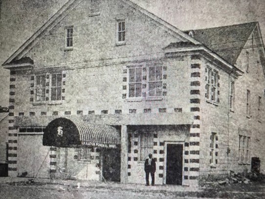 I. P. Hatch standing in front of his funeral home in New Bern, N.C., sometime around his 90th birthday in 1961. From I. P. Hatch, An Autobiography of I. P. Hatch (New Bern, N.C., 1963). Copy in the Kellenberger Room, New Bern-Craven County Public Library