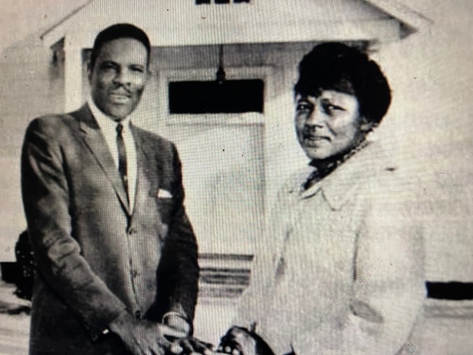Golden Frinks and Sarah Small posing in front of Green Memorial Church of Christ, Williamston, N.C., 1963-64. Photo by Capus Waynick. From North Carolina and the Negro (N.C. Mayor's Cooperating Committee, 1964)