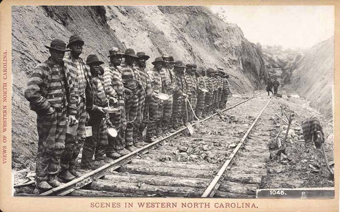 Between roughly 1870 and 1900, thousands of the state's convict laborers were forced to work on the Western North Carolina Railroad, a state-owned rail system. The work was brutal, and the mortality rate-- from accidents and illness-- was very high. Postcard courtesy, Hunter Library Special Collections, Western Carolina University, Cullowhee, NC.