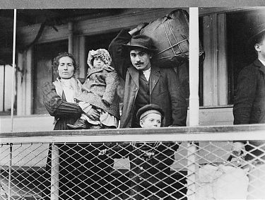 A family of Italian immigrants on the ferry from Ellis Island, ca. 1905. Photo by Lewis Hine. Courtesy, Library of Congress