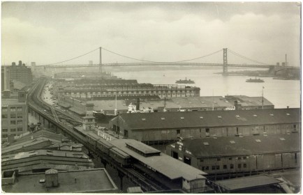 For more on Ocracoke Islanders and the dredging industry, see my story "Ocracoke and Philadelphia-- An Outer Banks Village, a Great Seaport and the Bond between Them." This photograph shows Delaware Avenue, Philadelphia, with the Delaware River and Benjamin Franklin Bridge in the background, early 20th century. Courtesy, kienantimberlake.org