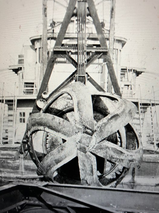 The Currituck's crew used this powerful rotating cutter head to break up the bottom, then utilized dredge pumps to suck in the broken-up material and transport it to a dump site, on land or sea, through pipes. This photograph-- dated 1932-- comes from the W. W. Old Collection at the Mariners Museum, Newport News, Va.
