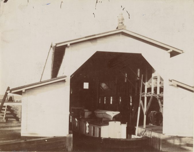 In this photograph, we can see the keeper's boat resting in the boathouse at the Long Point Light Station. Source: Records of the U.S. Coast Guard (RG 26), NA-College Park